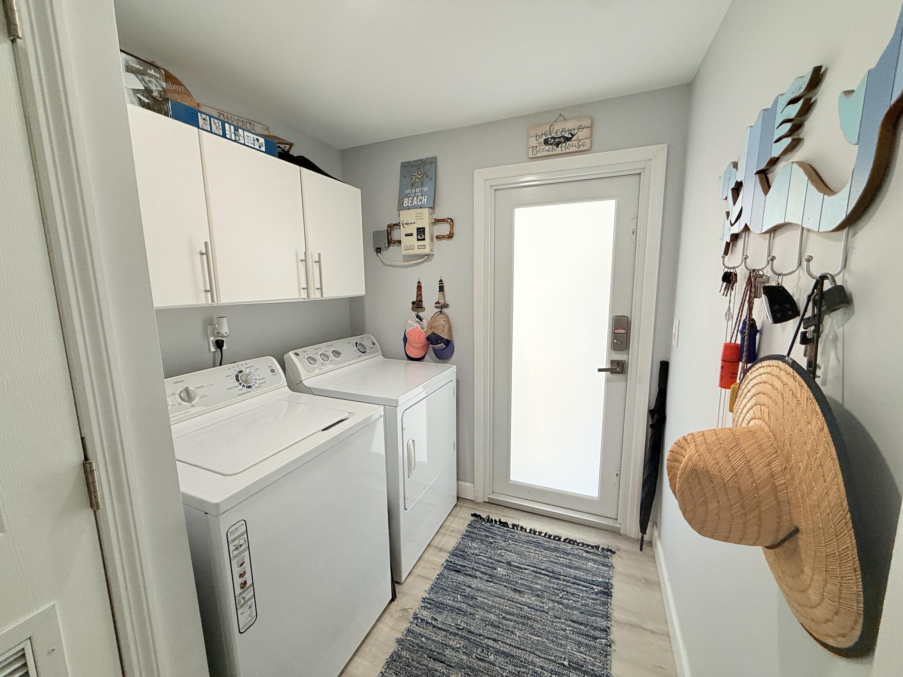 505 Oldsmar Lane Key Largo, FL 33037 - Photo 59 of 61 a utility room with dryer and washer