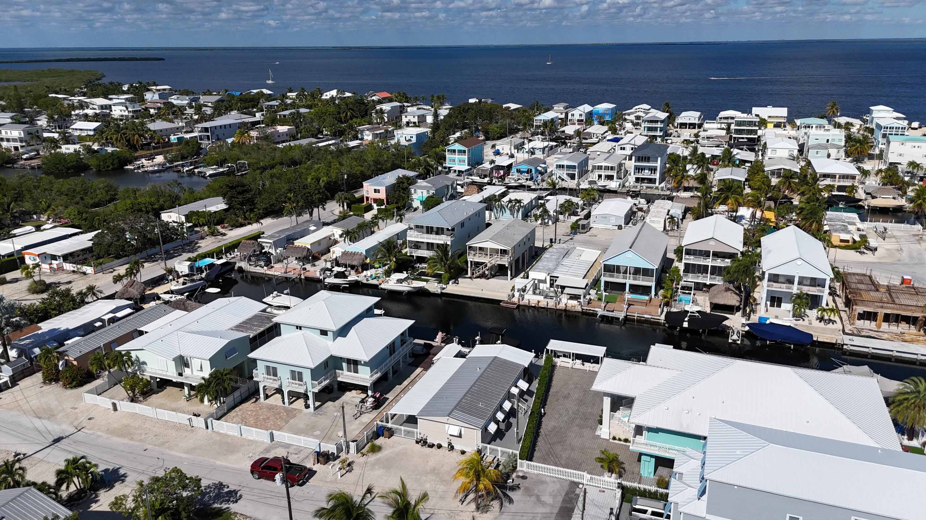 505 Oldsmar Lane Key Largo, FL 33037 - Photo 10 of 61 an aerial view of a building with outdoor space