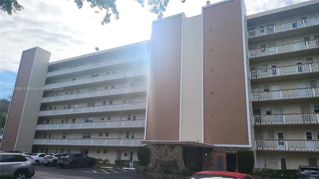 a view of swimming pool with outdoor seating