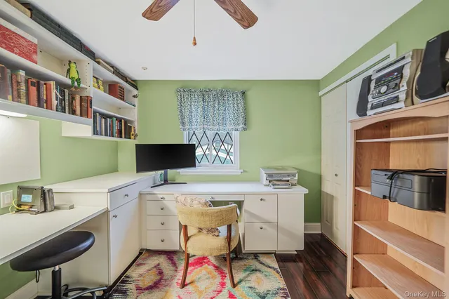 a view of a kitchen with a sink and cabinets