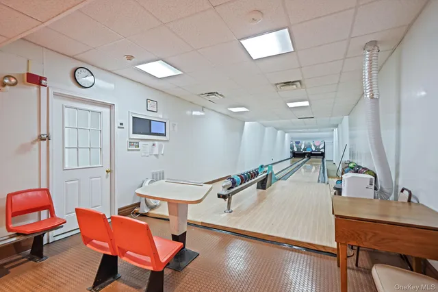 a room with furniture and wooden floor