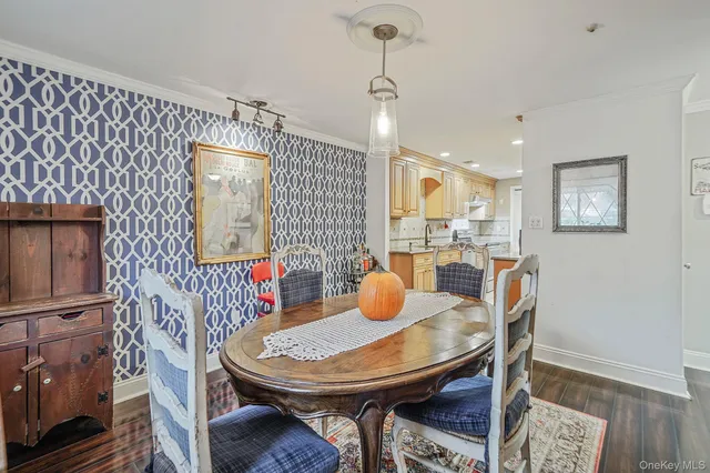 a view of a dining room with furniture