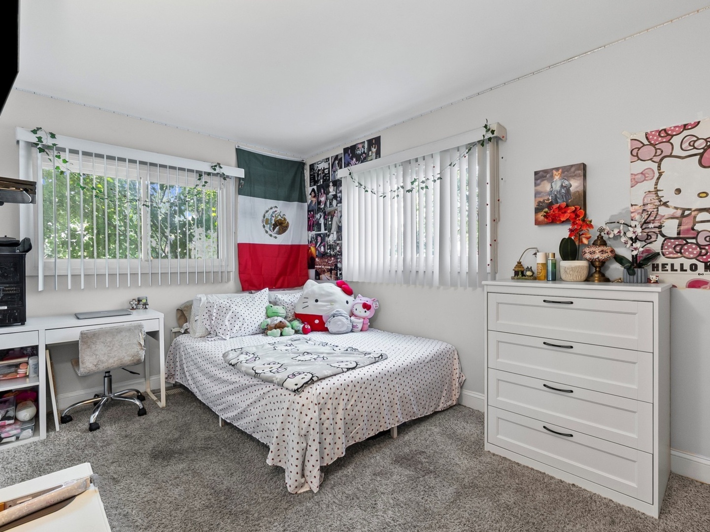 9N564 Flora Drive Elgin, IL 60123 - Photo 9 of 17 a bedroom with a bed table chair and window