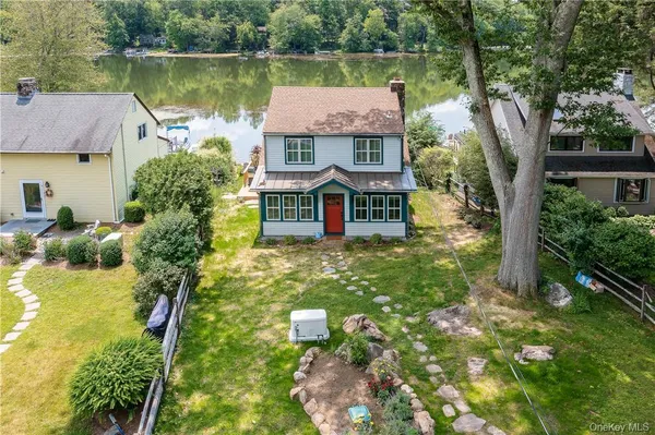 a view of a swimming pool with a lounge chairs