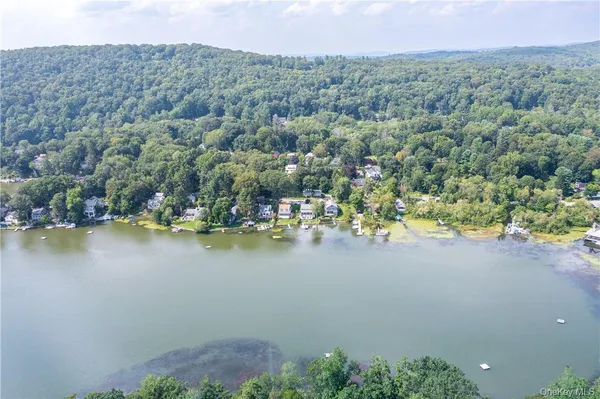 a view of a lake with a mountain in the background