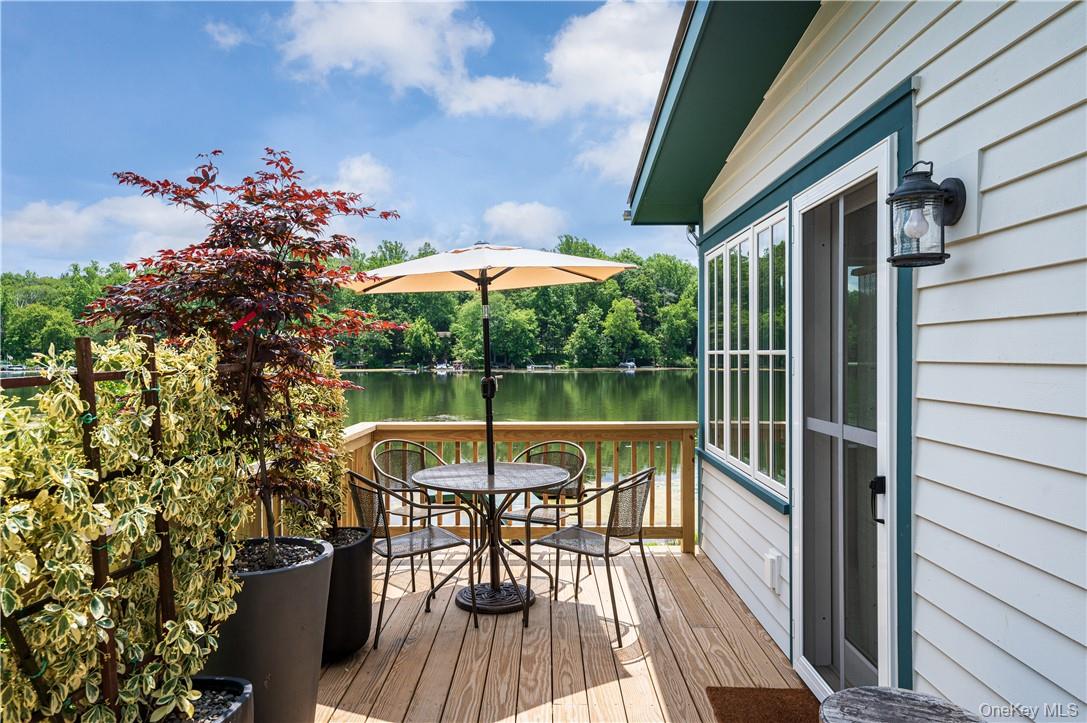 24 Cove Road South Salem, NY 10590 - Photo 25 of 26 a view of a chairs and table in the balcony