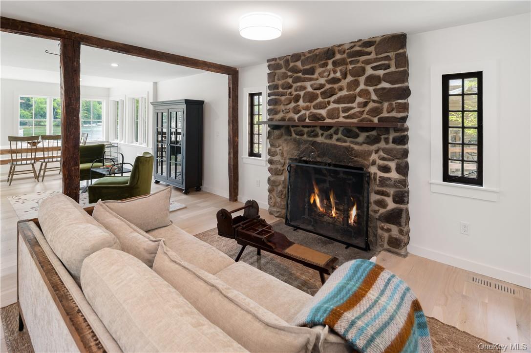 24 Cove Road South Salem, NY 10590 - Photo 5 of 26 a living room with furniture and a fireplace