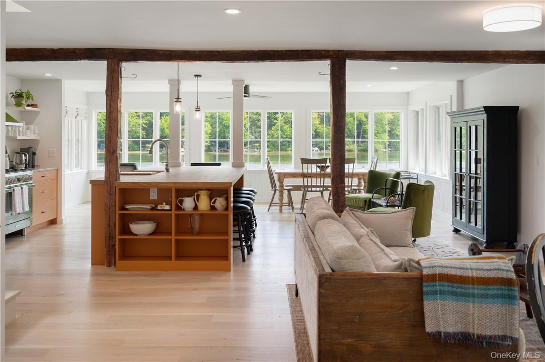 24 Cove Road South Salem, NY 10590 - Photo 5 of 26 a living room with fireplace furniture and a large window