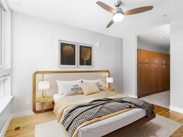 a bathroom with a double vanity sink mirror and shower