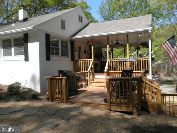 a view of a house with a porch and a porch