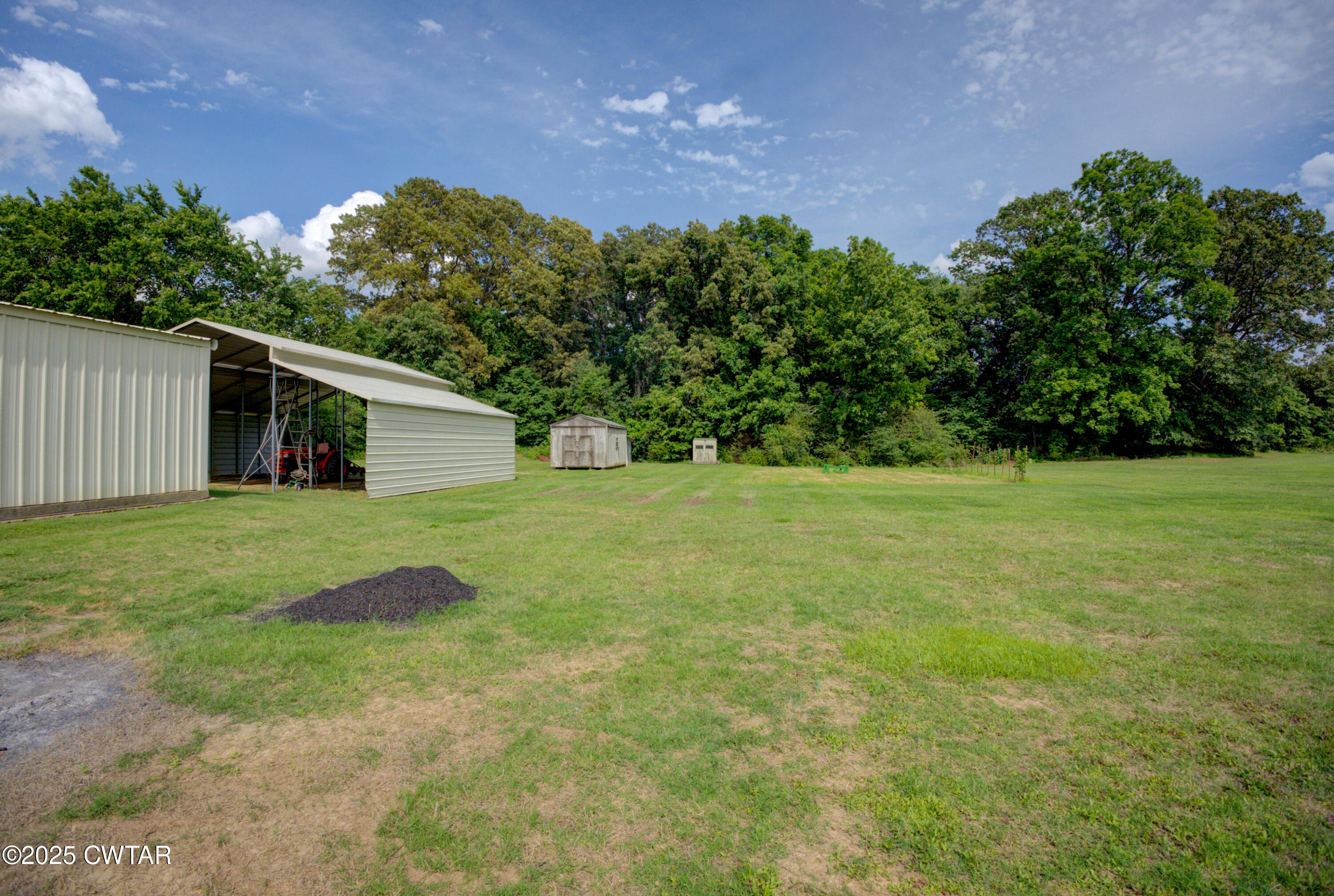 95 Stavely Road Medina, TN 38355 - Photo 31 of 33 a front view of house with yard and green space