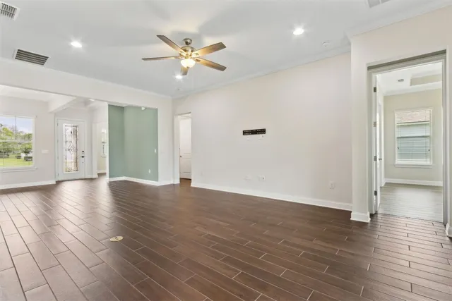 a kitchen that has a sink a stove and a refrigerator