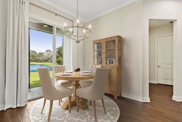 a bathroom with a granite countertop sink a toilet and a mirror