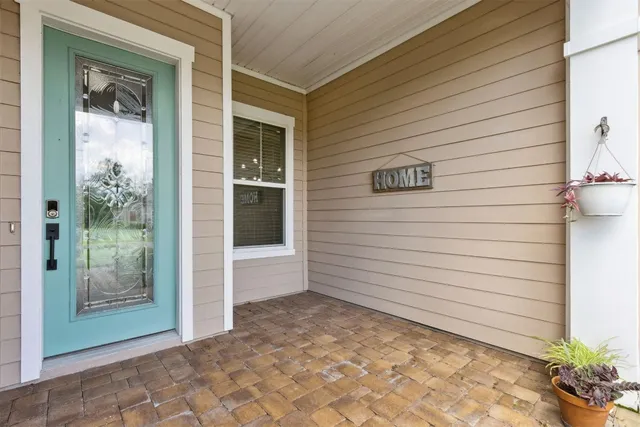 an empty room with wooden floor