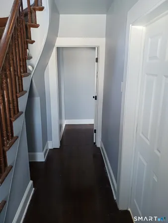 a view of hallway with stairs