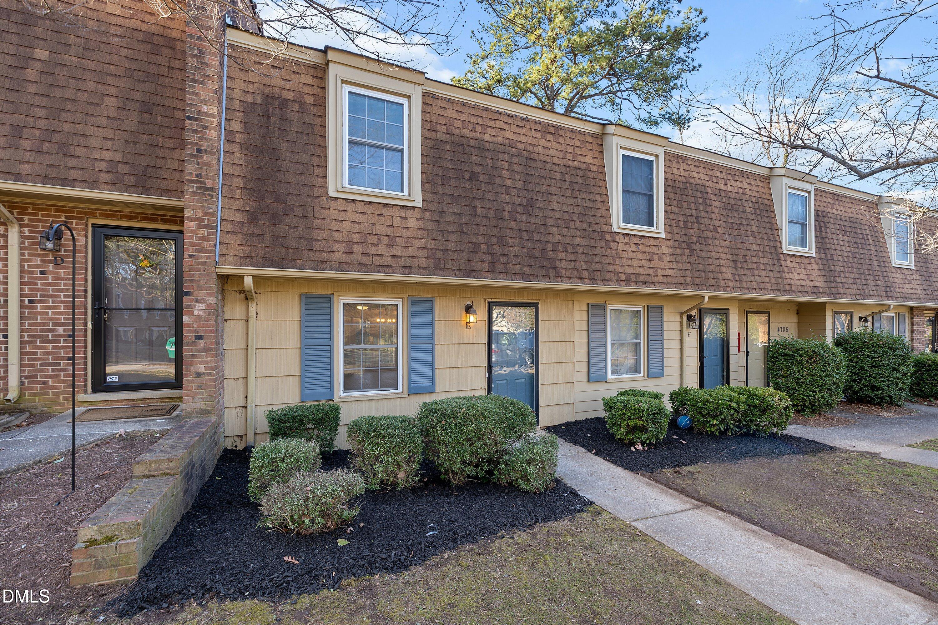 4705 Blue Bird Court, Unit E Raleigh, NC 27606 - Photo 25 of 32 a front view of a house