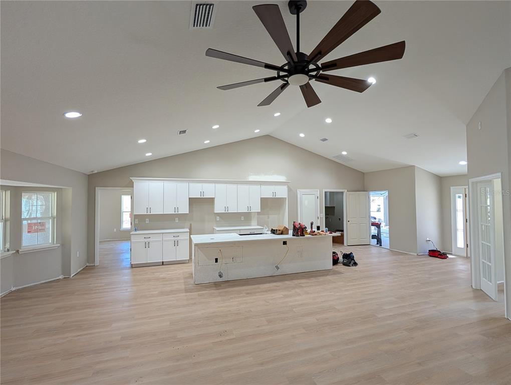 12769 Southwest 89th Street Dunnellon, FL 34432 - Photo 3 of 13 a view of a kitchen with a sink and a large window