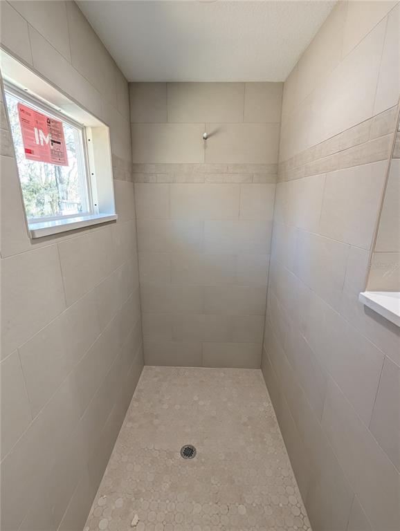 12769 Southwest 89th Street Dunnellon, FL 34432 - Photo 9 of 13 an empty room with a window