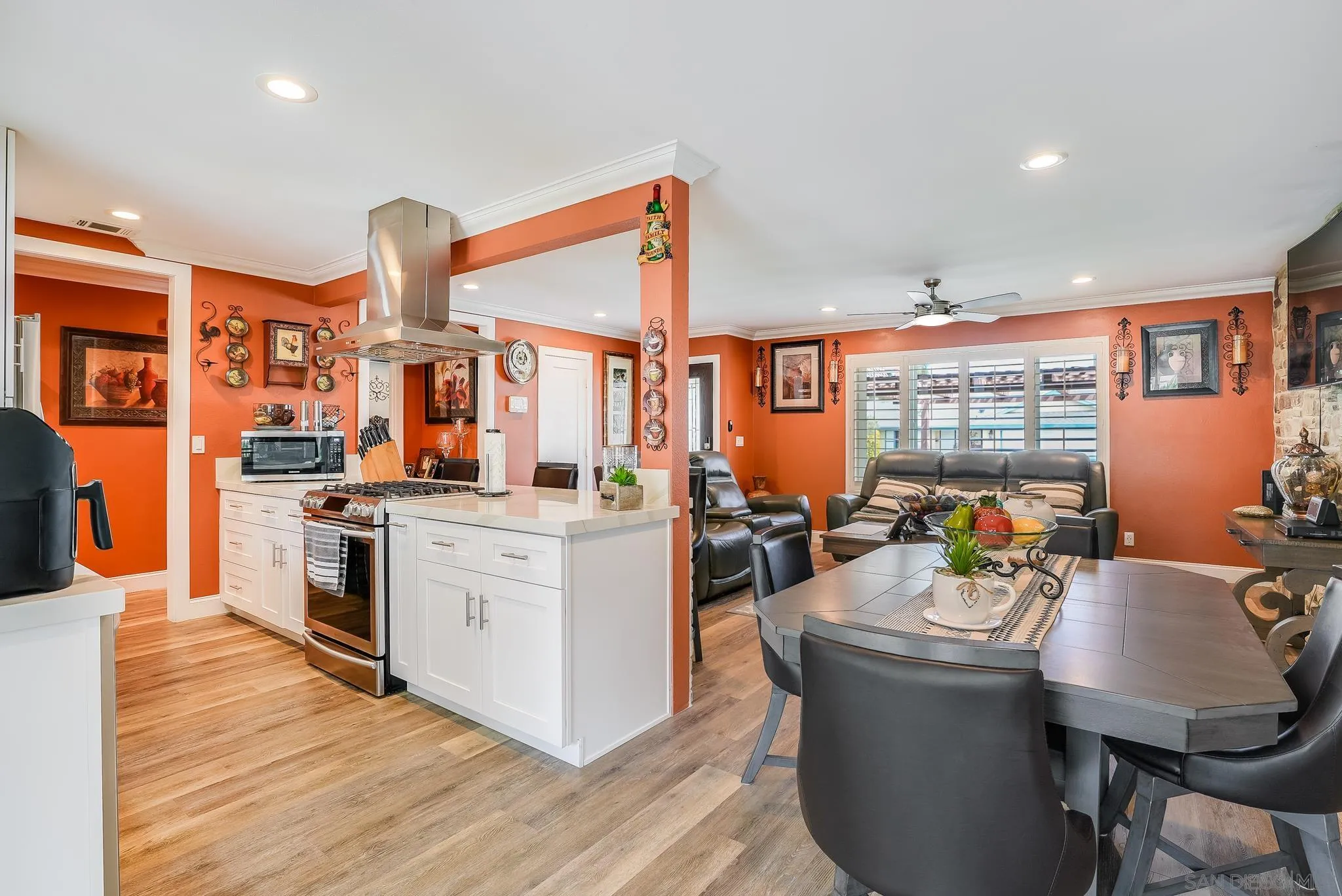 1851 Ithaca Street Chula Vista, CA 91913 - Photo 16 of 34 a kitchen with stainless steel appliances kitchen island granite countertop a stove and a sink