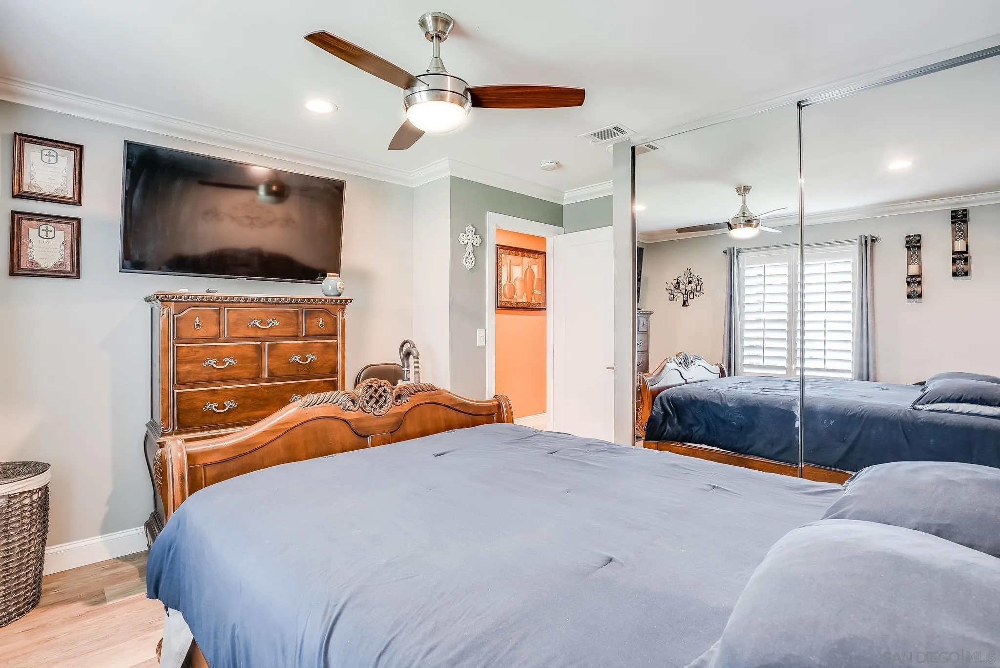 1851 Ithaca Street Chula Vista, CA 91913 - Photo 18 of 34 a bedroom with a bed and a flat screen tv