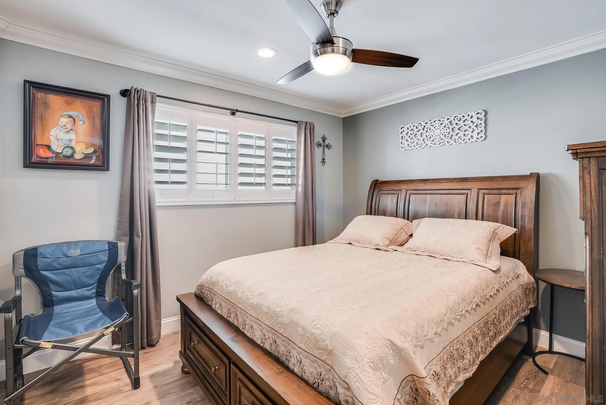 1851 Ithaca Street Chula Vista, CA 91913 - Photo 19 of 34 a bedroom with a large bed and a chair