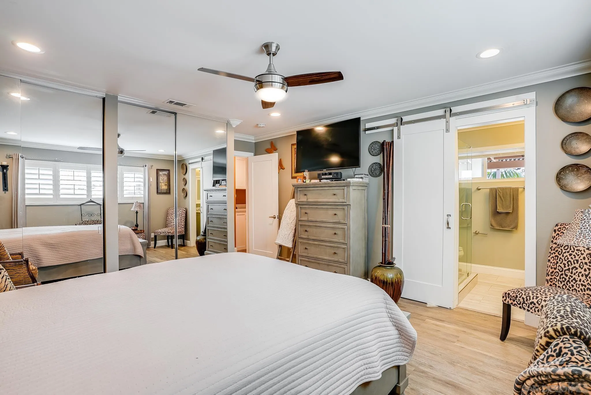 1851 Ithaca Street Chula Vista, CA 91913 - Photo 22 of 34 a bedroom with a bed and a flat screen tv