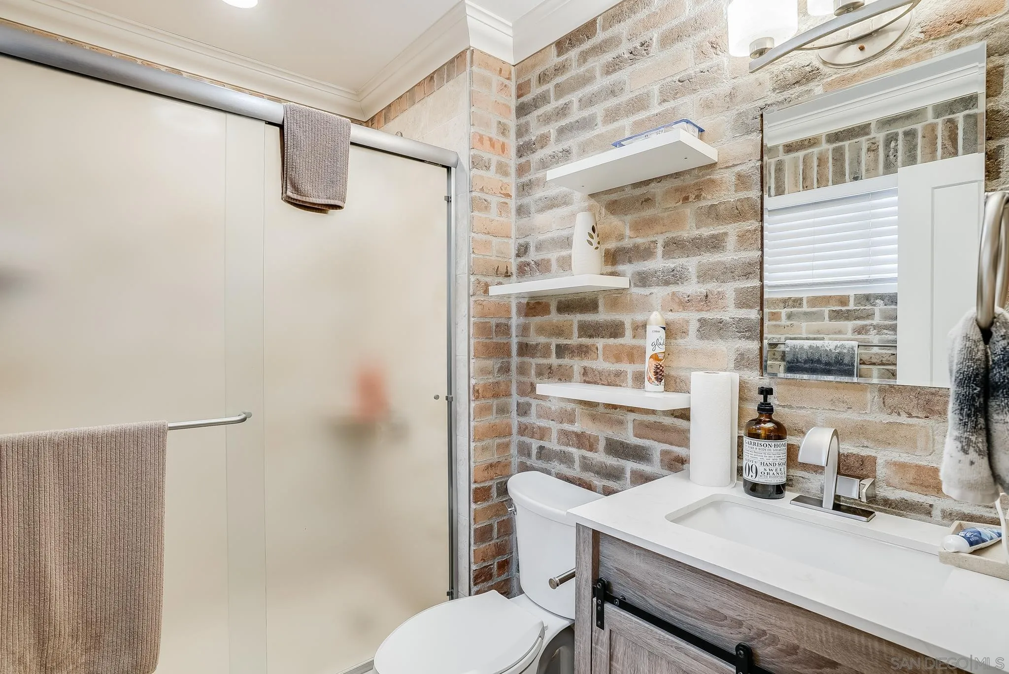 1851 Ithaca Street Chula Vista, CA 91913 - Photo 25 of 34 a bathroom with a sink toilet and shower
