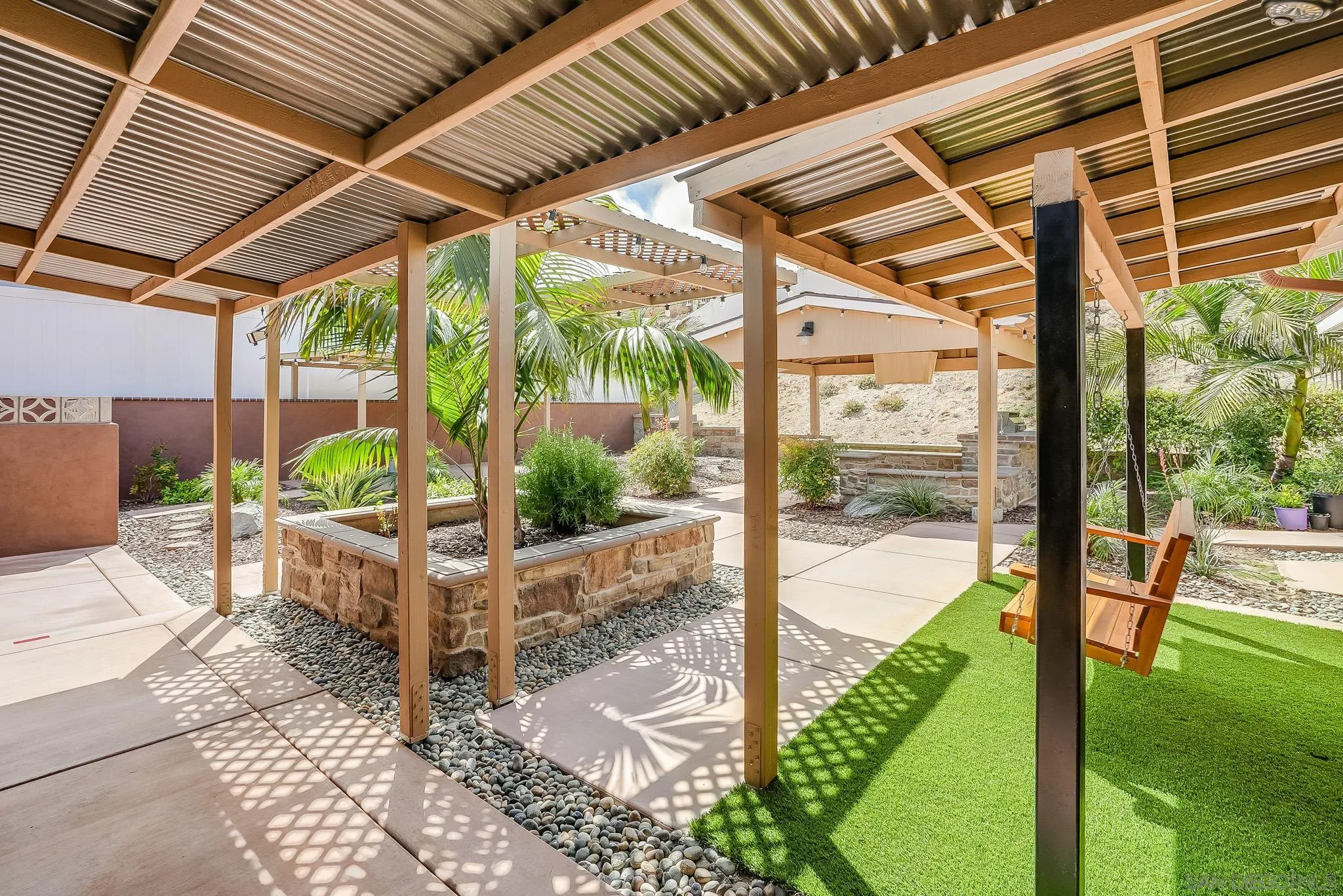 1851 Ithaca Street Chula Vista, CA 91913 - Photo 30 of 34 a view of a porch with furniture and a yard