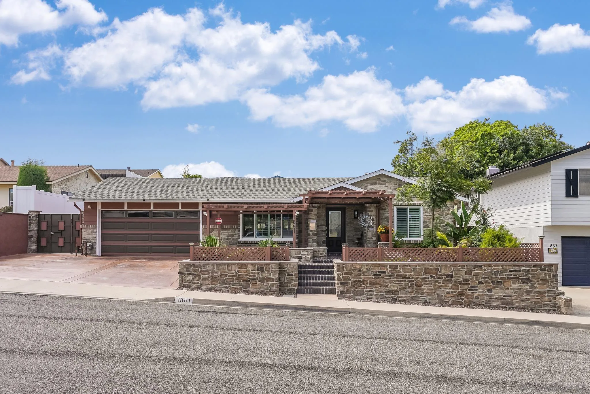 1851 Ithaca Street Chula Vista, CA 91913 - Photo 4 of 34 a front view of a house with a yard