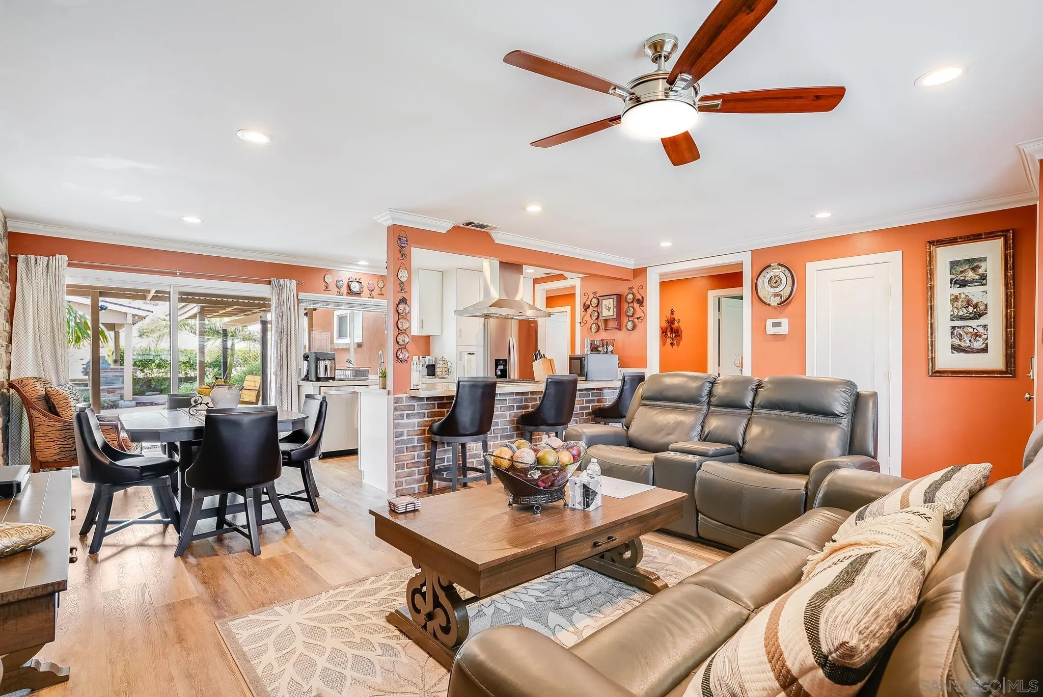 1851 Ithaca Street Chula Vista, CA 91913 - Photo 9 of 34 a living room with furniture a ceiling fan and a large window