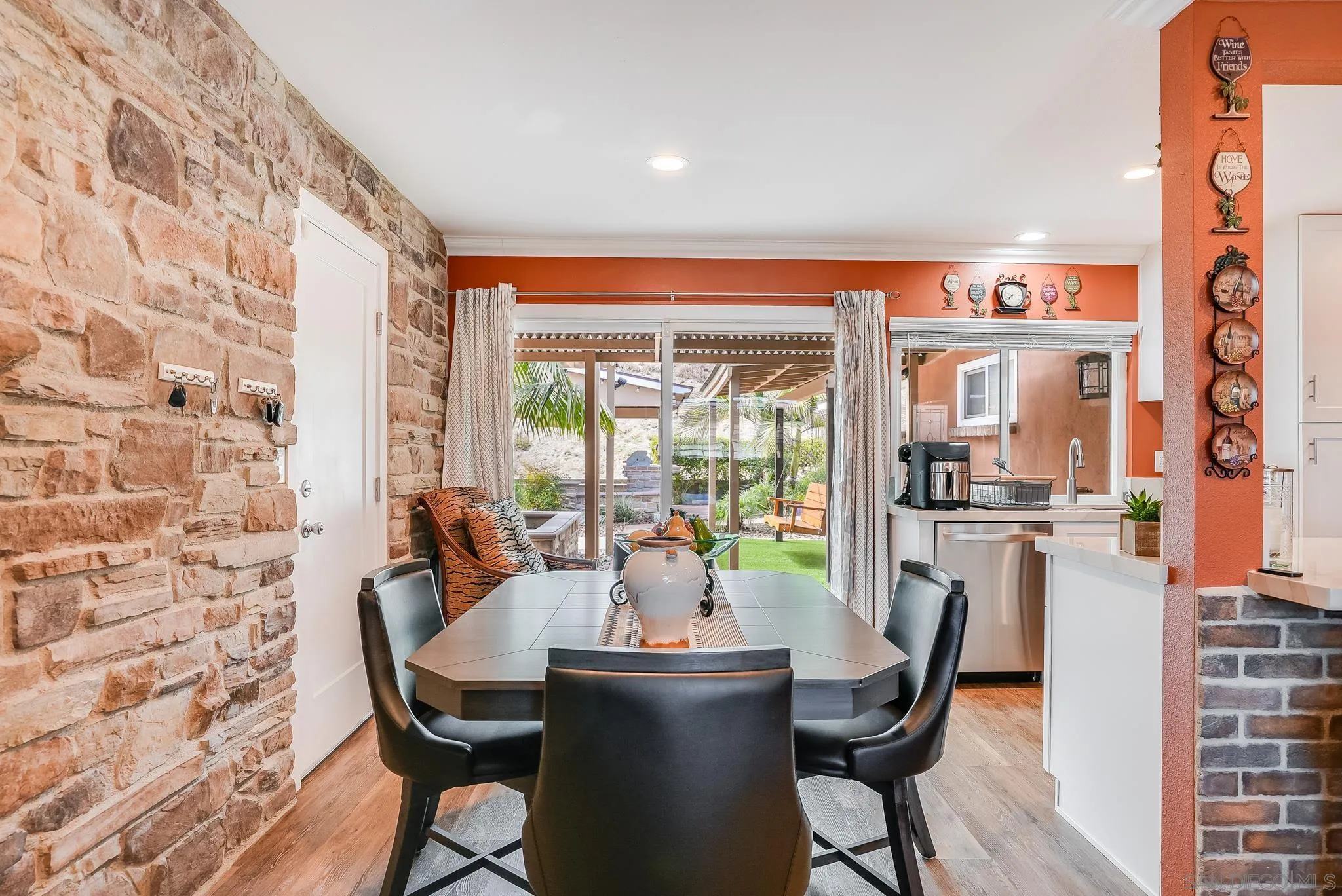 1851 Ithaca Street Chula Vista, CA 91913 - Photo 10 of 34 a dining room with furniture and wooden floor