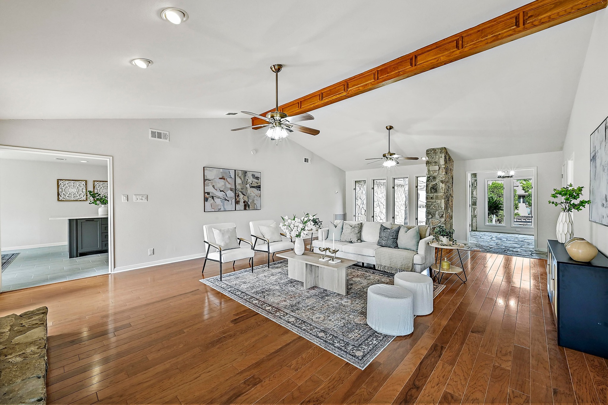 Welcome Home to 107 Boot Hill! Featuring an oversized lot backing to the greenbelt. Living room featuring a ceiling fan, a fireplace, and light wood finished floors
