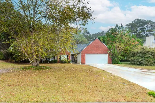 a house with trees in front of it