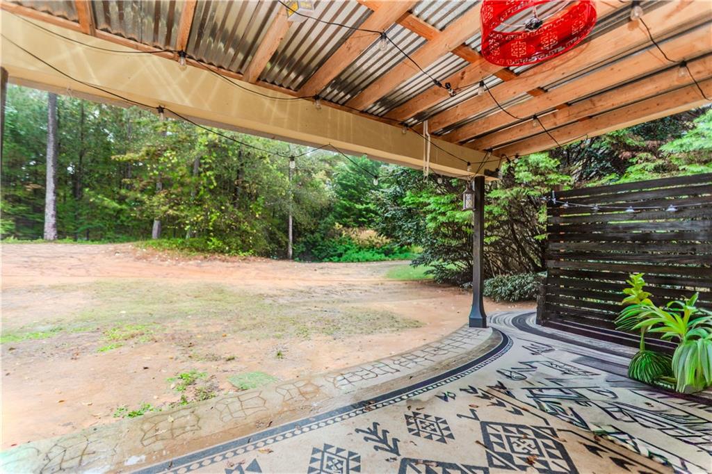 2790 Alcovy River View Dacula, GA 30019 - Photo 23 of 25 a view of a backyard with wooden fence