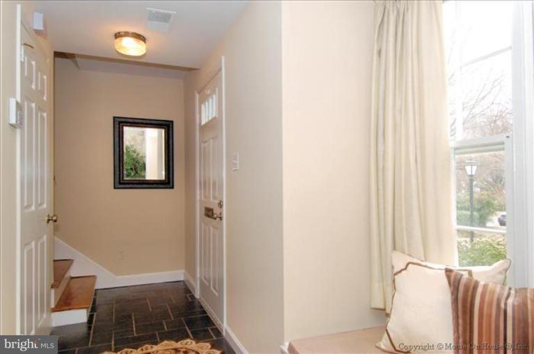 6735 Fairfax Road, Unit 9 Chevy Chase, MD 20815 - Photo 8 of 22 Tile floor in foyer.