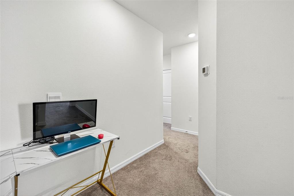 193 Mangrove Shade Circle Apollo Beach, FL 33572 - Photo 18 of 47 a workspace with furniture and mirror