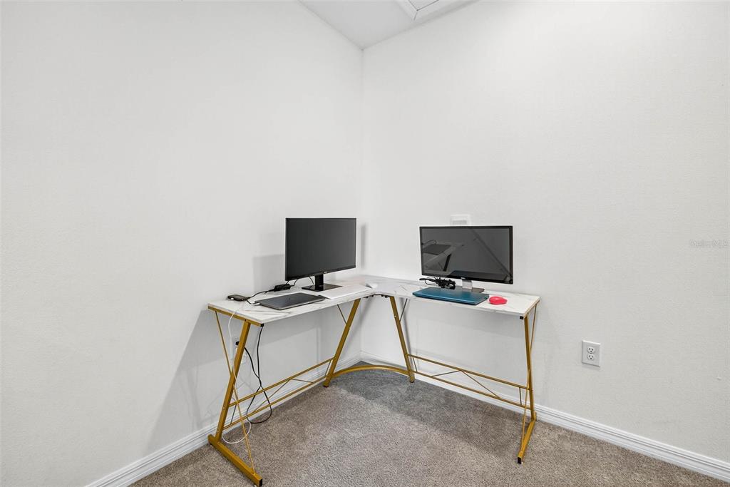 193 Mangrove Shade Circle Apollo Beach, FL 33572 - Photo 19 of 47 a view of a workspace with furniture