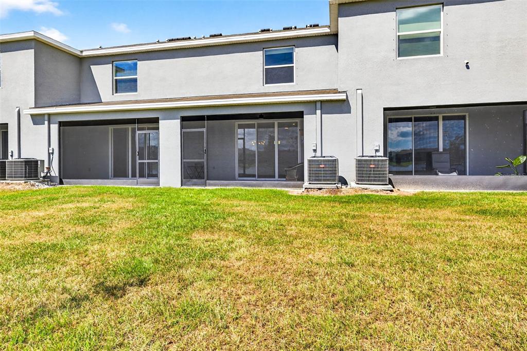 193 Mangrove Shade Circle Apollo Beach, FL 33572 - Photo 37 of 47 a house view with swimming pool in front of it