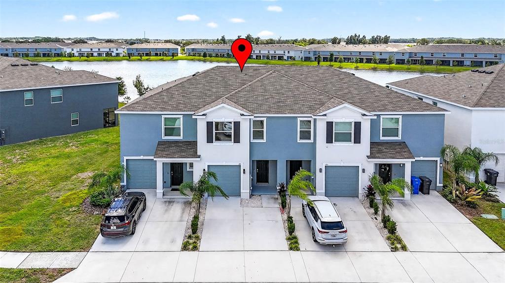 193 Mangrove Shade Circle Apollo Beach, FL 33572 - Photo 39 of 47 an aerial view of a house with outdoor space and ocean view