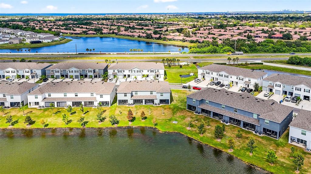 193 Mangrove Shade Circle Apollo Beach, FL 33572 - Photo 41 of 47 an aerial view of a swimming pool with lawn chairs