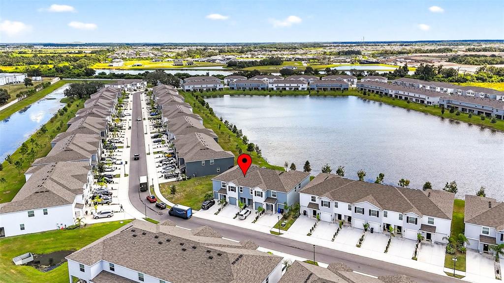 193 Mangrove Shade Circle Apollo Beach, FL 33572 - Photo 46 of 47 a view of a city and an ocean view