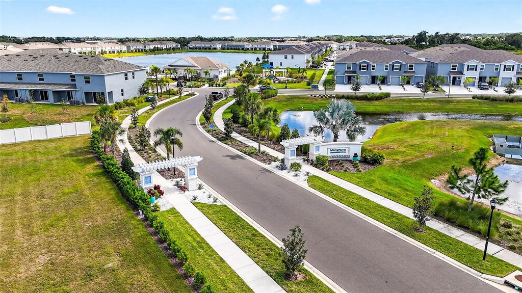 193 Mangrove Shade Circle Apollo Beach, FL 33572 - Photo 47 of 47 a view of a city with lawn chairs