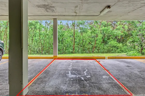 a view of a balcony with wooden floor and city view