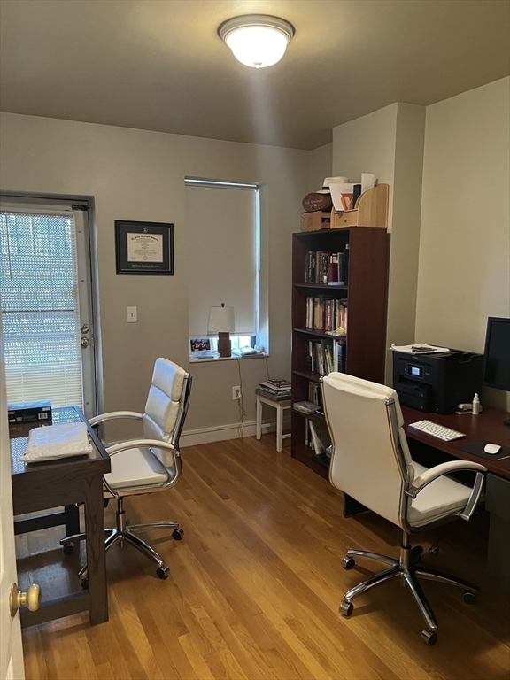 14 Linwood Street, Unit 2 Boston, MA 02119 - Photo 17 of 23 a view of a workspace with furniture and a window
