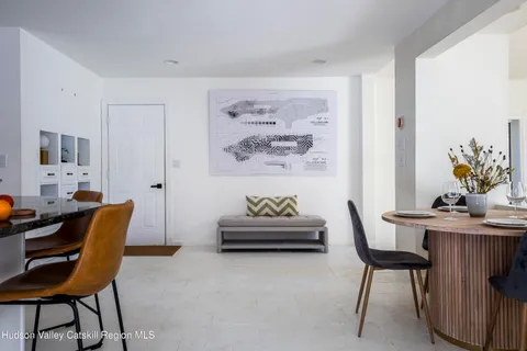 a view of a workspace with furniture and a couch