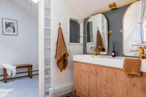 a view of living room with furniture and a flat screen tv