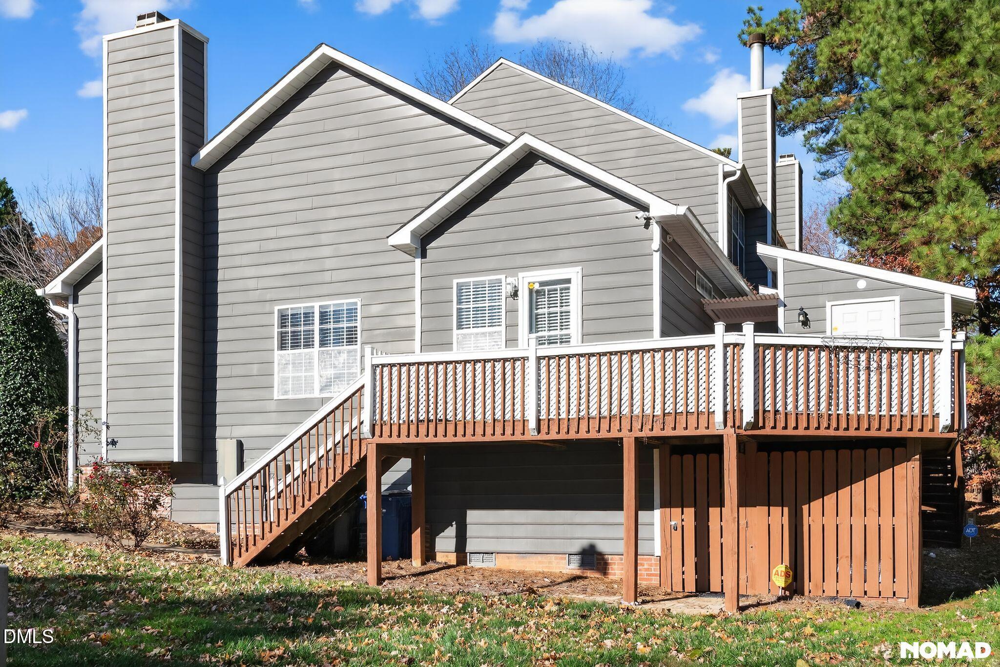 4456 Still Pines Drive Raleigh, NC 27613 - Photo 16 of 16 a view of a house with a yard