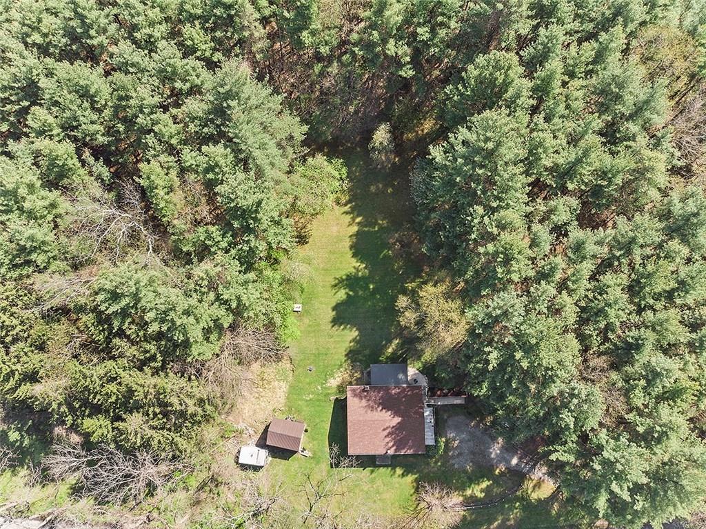 489 Rowe Road Harrison City, PA 15636 - Photo 3 of 18 Right out of a story book, this hidden gem provides a private oasis surrounded by trees, the sounds of birds chirping & deer in the yard!