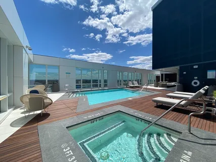 a view of a backyard with sitting area