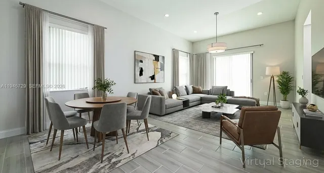 a bathroom with double vanity sink a mirror and a shower